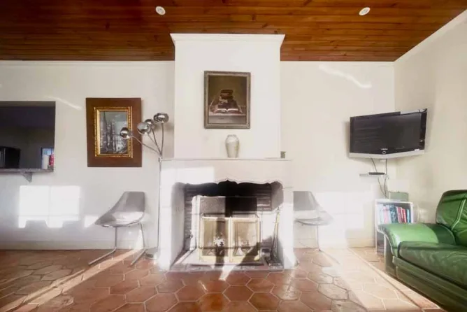 The living room has a fireplace