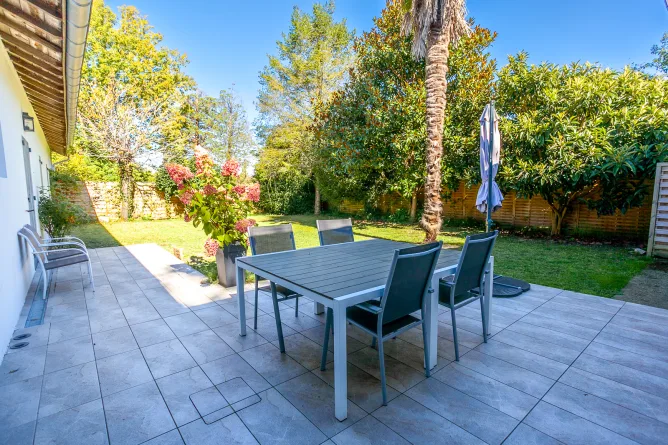 There's a welcoming terrace where you can enjoy meals and aperitifs overlooking the garden.